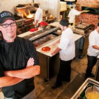 Owner and head chef Gus Bays in the kitchen at radius brewing company