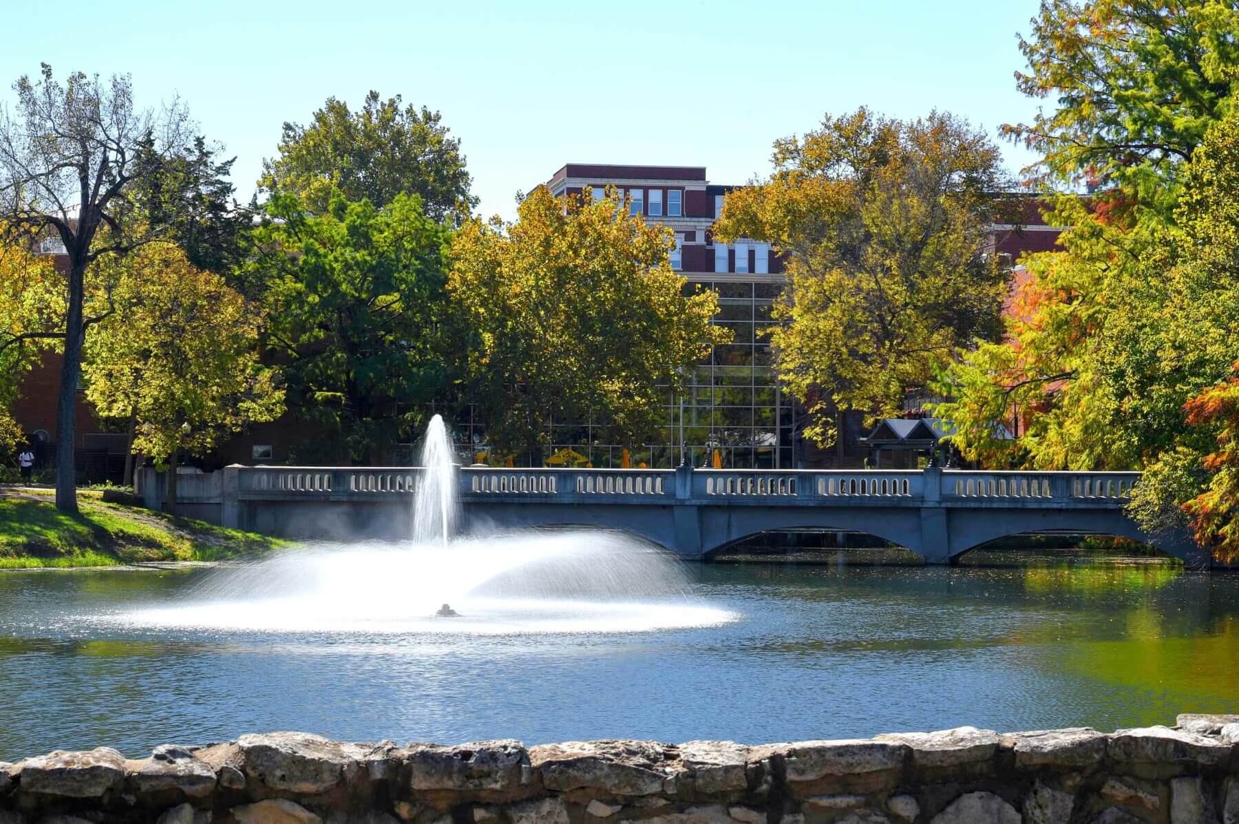 the fountain at wooster lake on the Emporia State University campus